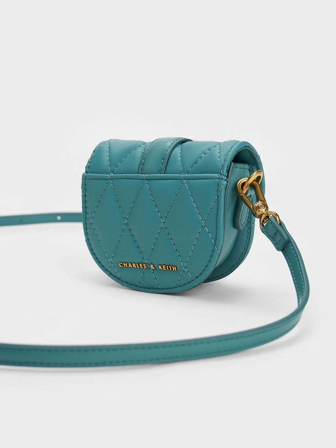 BOXED Charles & Keith Micro Gabine Quilted Saddle Bag - Teal