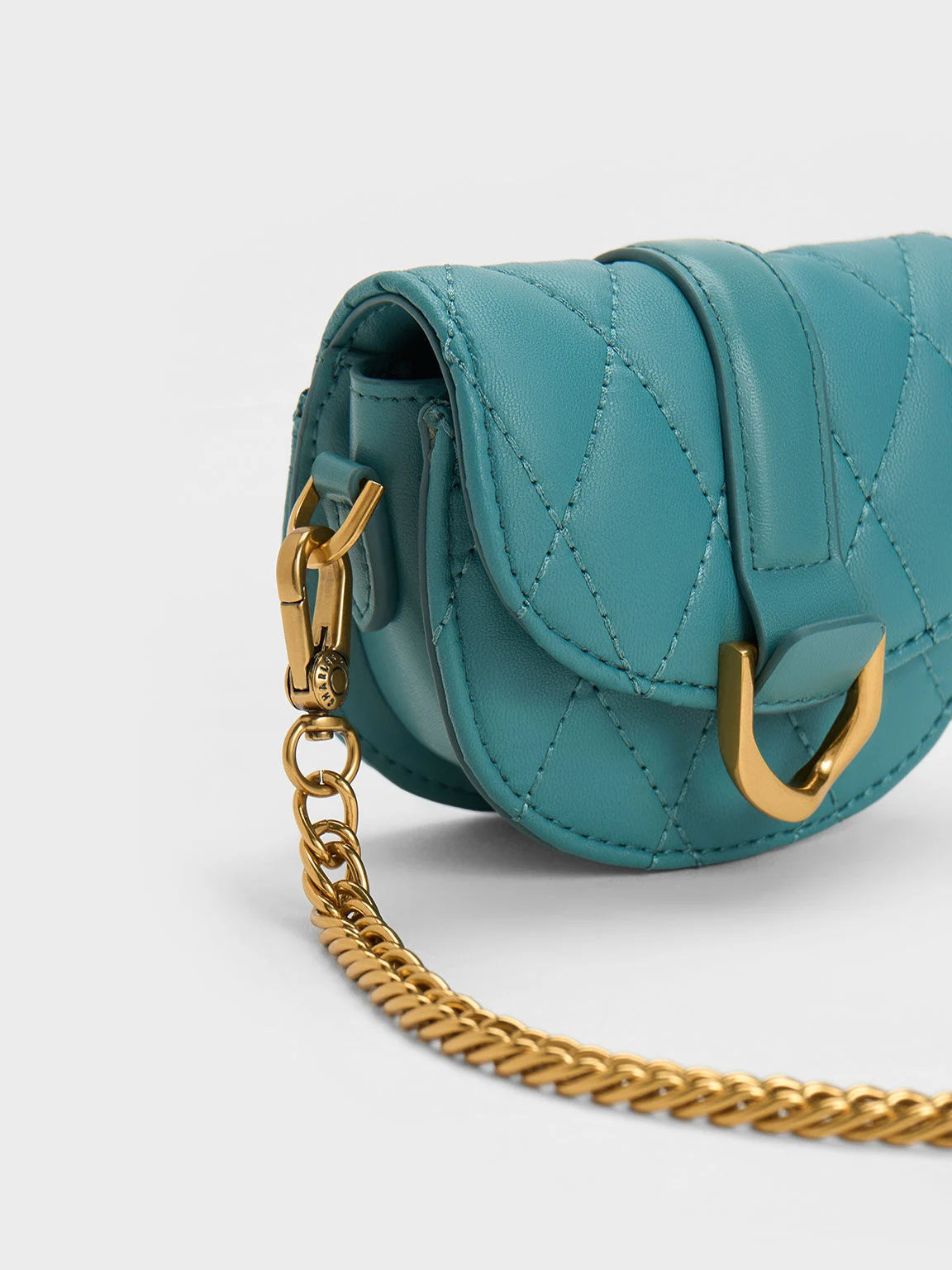 BOXED Charles & Keith Micro Gabine Quilted Saddle Bag - Teal